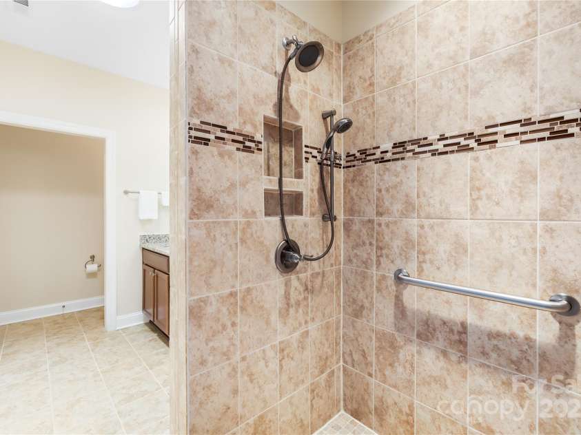 135 Valleymist Lane, Mooresville, NC 28117.  MLS# CAR4278379, YatesRealty ID 32395. Easy access tile shower