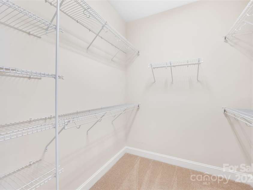 135 Valleymist Lane, Mooresville, NC 28117.  MLS# CAR4278379, YatesRealty ID 32395. Primary walk in closet