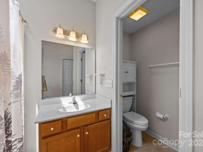 8 Beekeeper Trail, Swannanoa, NC 28778.  MLS# CAR4280414, YatesRealty ID 32396. Ensuite bathroom upstairs-