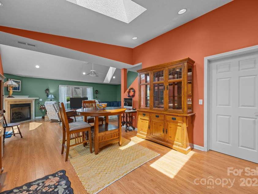 8 Beekeeper Trail, Swannanoa, NC 28778.  MLS# CAR4280414, YatesRealty ID 32396. Kitchen has entryway to laundry, powder room, ensuite bathroom and primary bedroom.