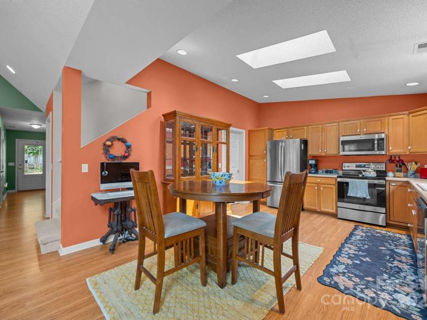 8 Beekeeper Trail, Swannanoa, NC 28778.  MLS# CAR4280414, YatesRealty ID 32396. Kitchen with more skylights offering natural light-
