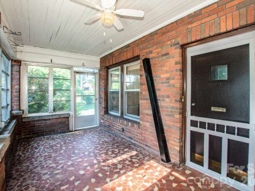 801 4th Street, Spencer, NC 28159.  MLS# CAR4392657, YatesRealty ID 32398. Enclosed Front Porch