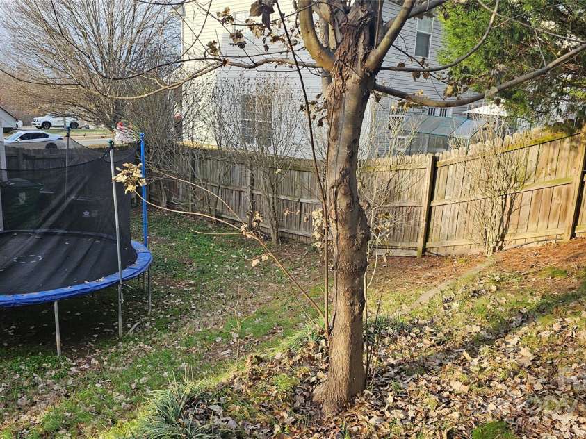 6334 Dillard Ridge Drive, Charlotte, NC 28216.  MLS# CAR4206693, YatesRealty ID 324. Partial view of backyard. There is a lot playground/work equipment in backyard. Owner is moving it out ASAP.
