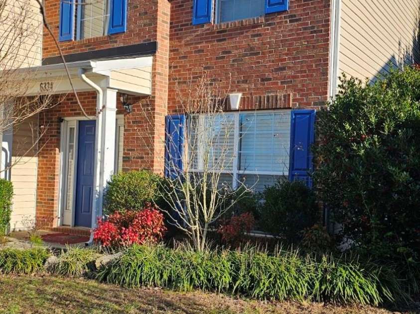 6334 Dillard Ridge Drive, Charlotte, NC 28216.  MLS# CAR4206693, YatesRealty ID 324. Right of the house from the street. 