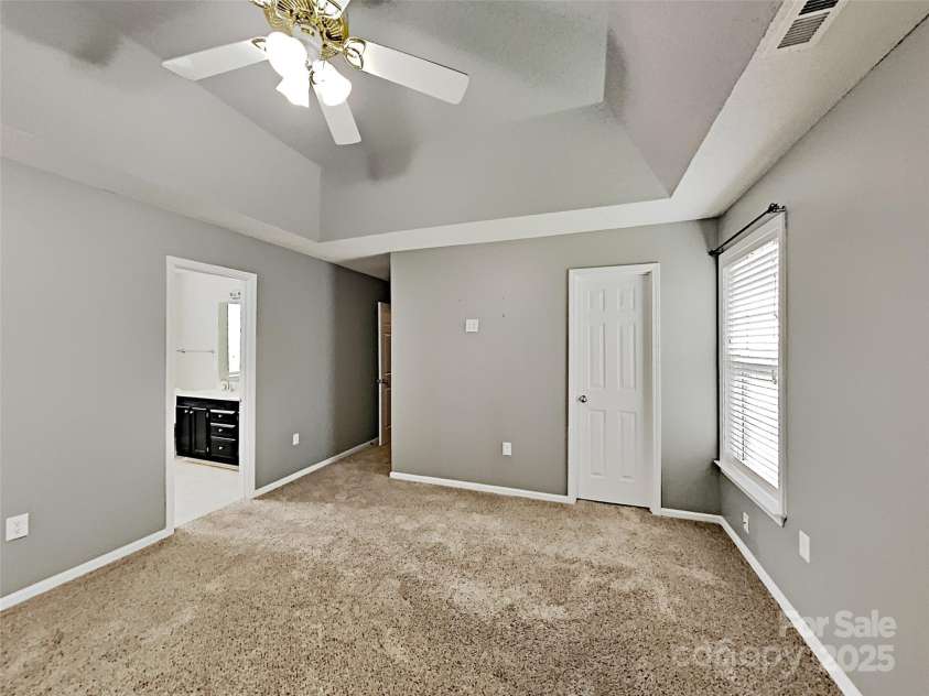 184 Rocky Knoll Court, Denver, NC 28037.  MLS# CAR4288385, YatesRealty ID 32402. Primary Bedroom