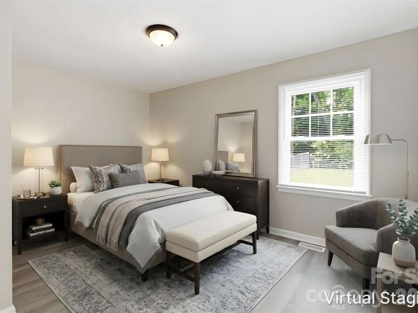 2732 Thornton Road, Charlotte, NC 28208.  MLS# CAR4394385, YatesRealty ID 32403. Walking into the primary bedroom, which includes ensuite full bath (virtually staged & enhanced).