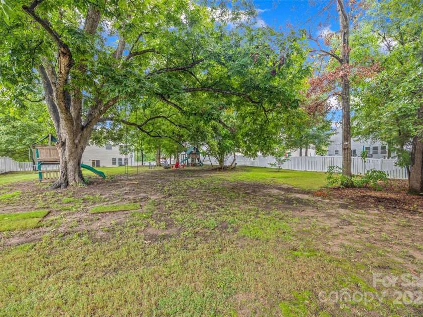 409 Garden Grove Road, Fort Mill, SC 29708.  MLS# CAR4290523, YatesRealty ID 32408. Almost 1/2 acre