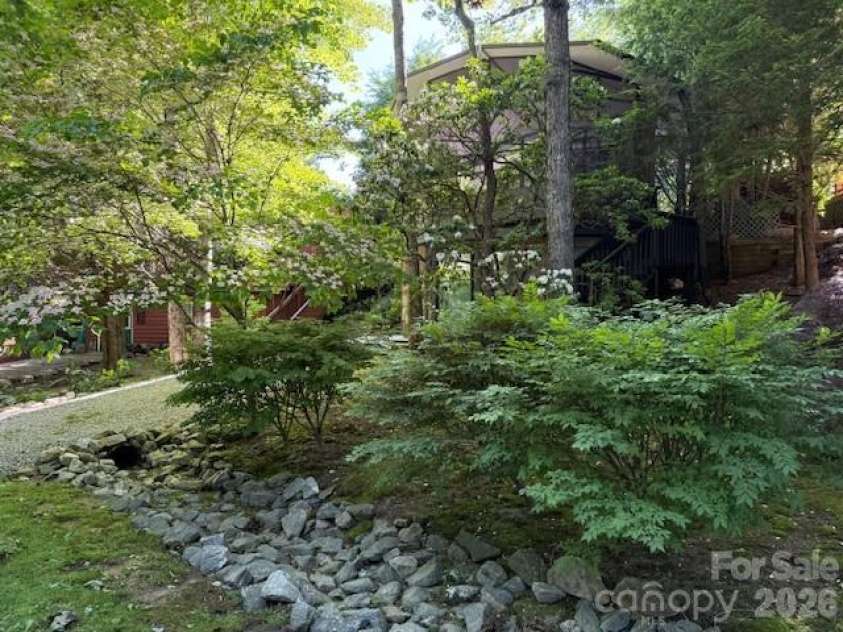 26 Cumberland Drive, Lake Toxaway, NC 28747.  MLS# CAR4361302, YatesRealty ID 32410. Back side view