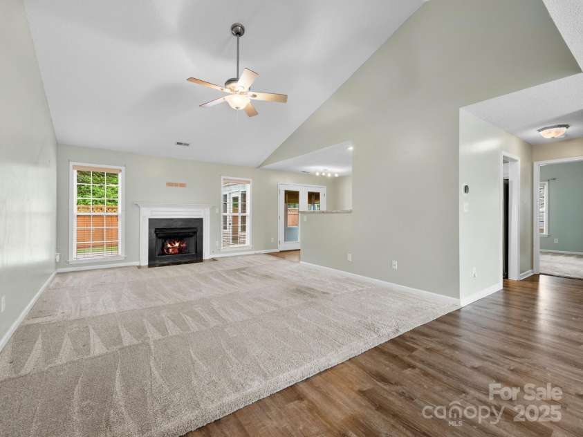 42 Morning Mist Road, Fletcher, NC 28732.  MLS# CAR4292025, YatesRealty ID 32410. Living area has an airy feel with sightlines into the dining area and kitchen.