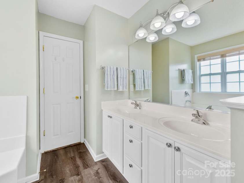 42 Morning Mist Road, Fletcher, NC 28732.  MLS# CAR4292025, YatesRealty ID 32410. Primary bathroom with double sinks