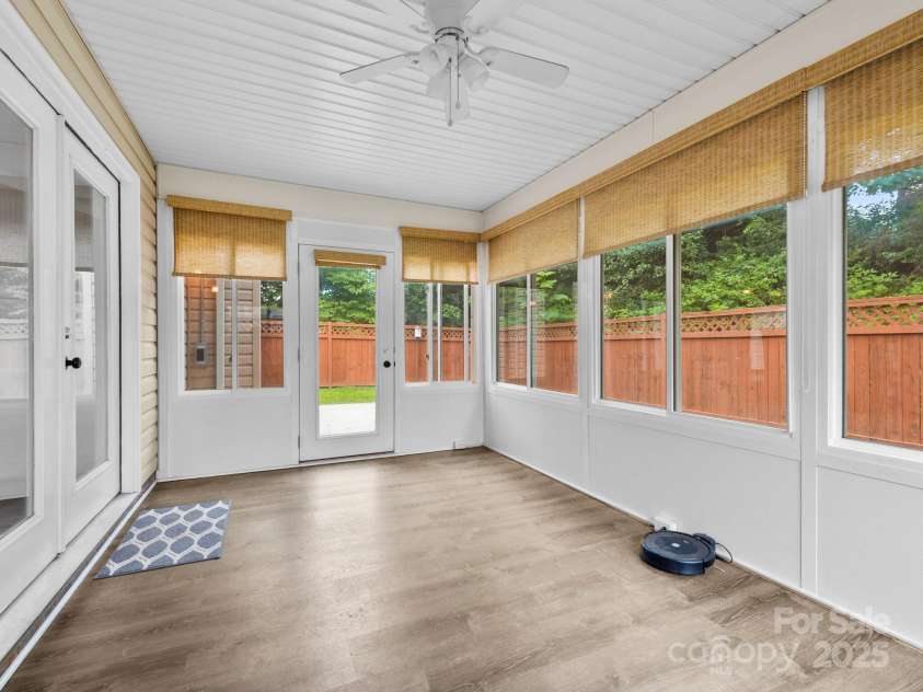 42 Morning Mist Road, Fletcher, NC 28732.  MLS# CAR4292025, YatesRealty ID 32410. Sunroom with access to the patio