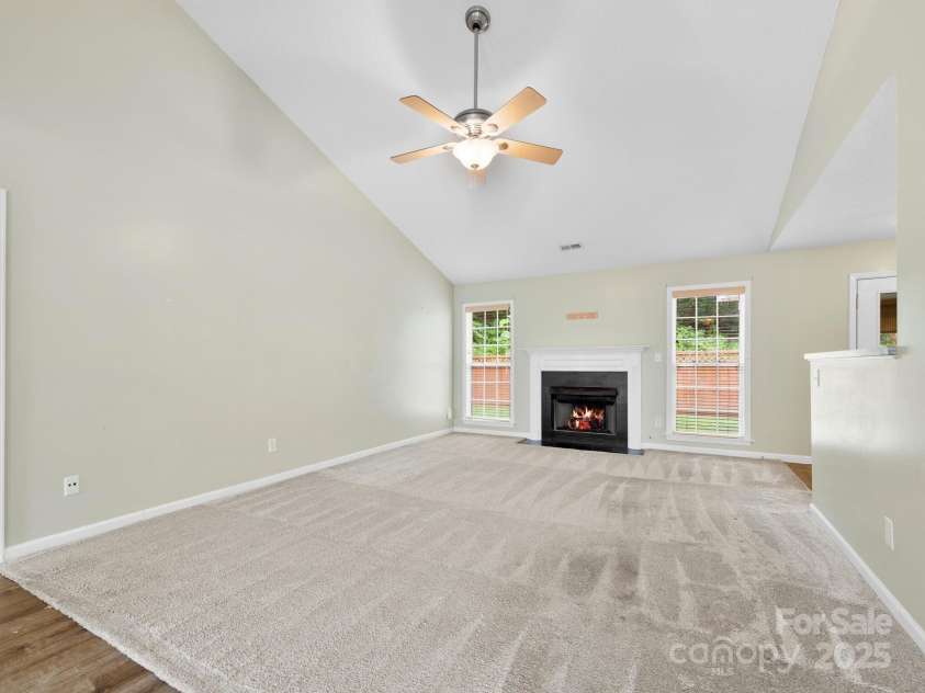 42 Morning Mist Road, Fletcher, NC 28732.  MLS# CAR4292025, YatesRealty ID 32410. Through the front door, you are greeted with vaulted ceilings and a spacious living area.