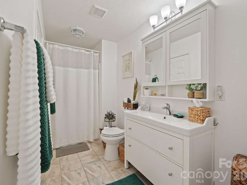1133 Finger Bridge Road, Hickory, NC 28602.  MLS# CAR4393755, YatesRealty ID 32414. Lower level bath/2nd washer/dryer connection