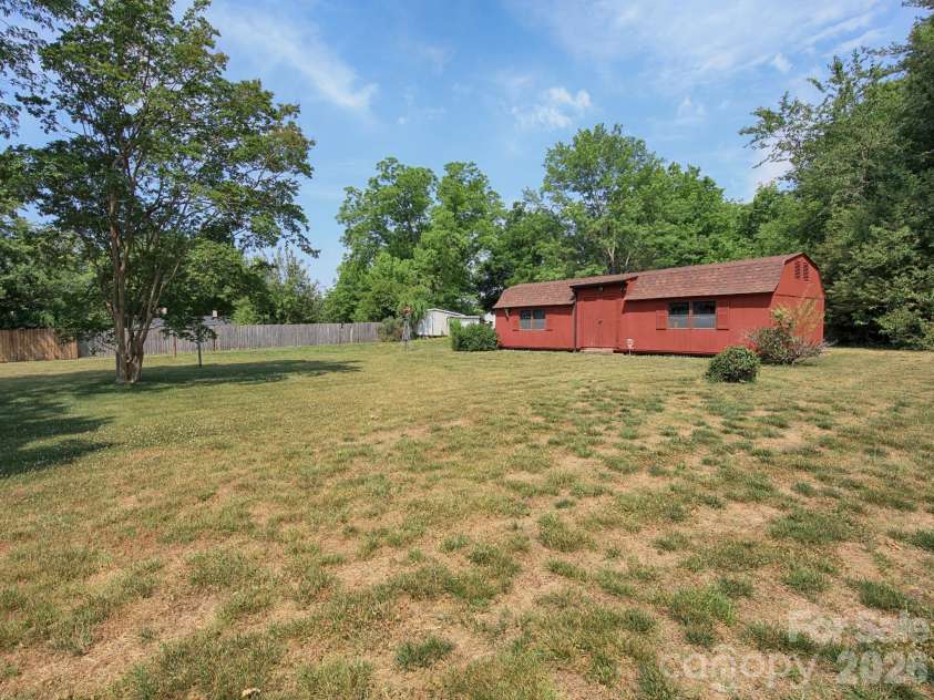 1005 Forest Park Drive, Statesville, NC 28677.  MLS# CAR4374714, YatesRealty ID 32415. Back Line runs behind Storage Bldg.