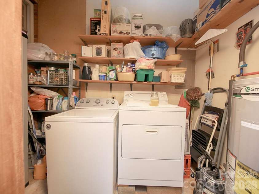 1005 Forest Park Drive, Statesville, NC 28677.  MLS# CAR4374714, YatesRealty ID 32415. Laundry Room with Shelving