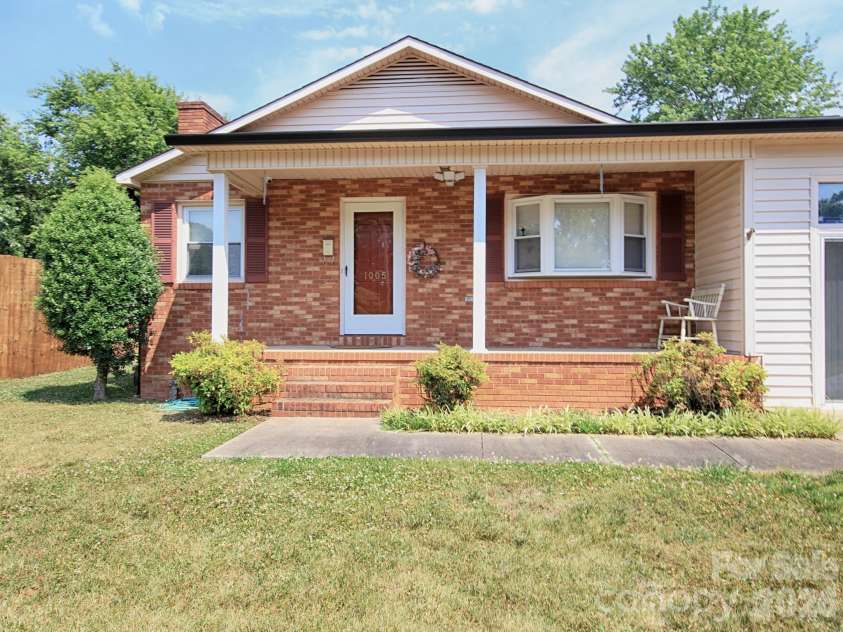1005 Forest Park Drive, Statesville, NC 28677.  MLS# CAR4374714, YatesRealty ID 32415. Rocking Chair Front Porch