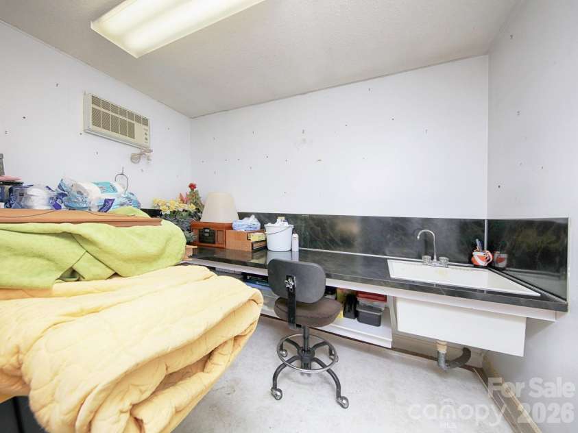 1005 Forest Park Drive, Statesville, NC 28677.  MLS# CAR4374714, YatesRealty ID 32415. Storage Room off Garage