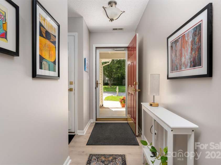 330 Stonehollow Road, Fletcher, NC 28732.  MLS# CAR4271829, YatesRealty ID 32415. A welcoming foyer with new entry locks/keys on the front, garage, and back doors.