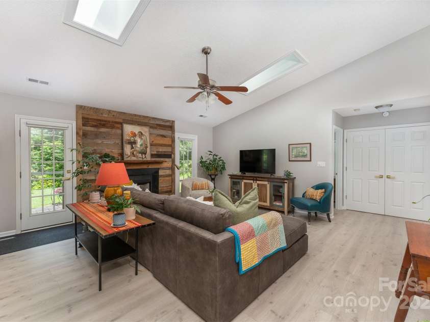 330 Stonehollow Road, Fletcher, NC 28732.  MLS# CAR4271829, YatesRealty ID 32415. Here you can see where the laundry closet is behind the two white doors on the right side of the photo