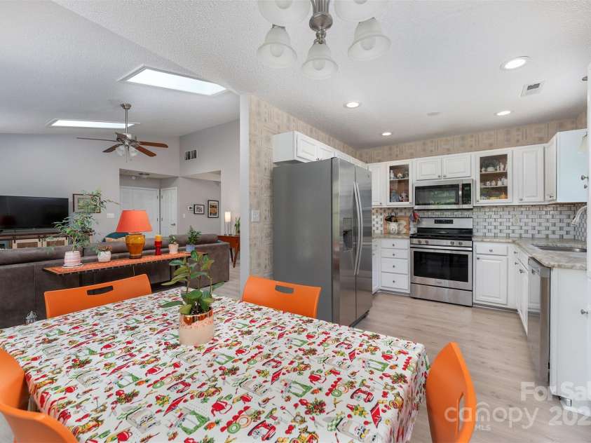 330 Stonehollow Road, Fletcher, NC 28732.  MLS# CAR4271829, YatesRealty ID 32415. Leathered granite counters and LVP flooring are great upgrades to this space