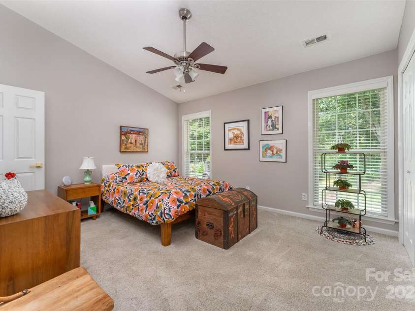 330 Stonehollow Road, Fletcher, NC 28732.  MLS# CAR4271829, YatesRealty ID 32415. Vaulted ceiling in the primary bedroom give this room a lift!