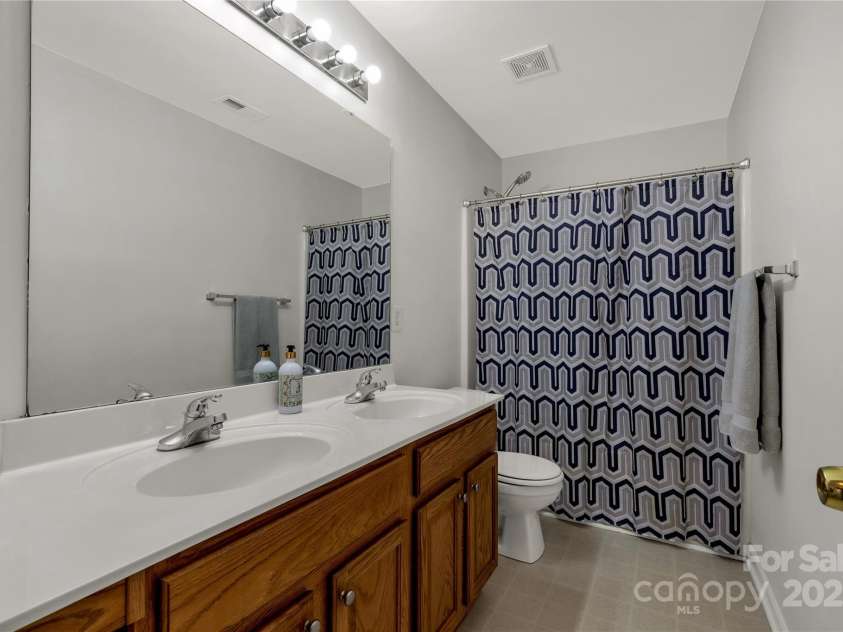 1993 Foxwood Court, Indian Land, SC 29707.  MLS# CAR4280194, YatesRealty ID 32417. Hall bathroom upstairs