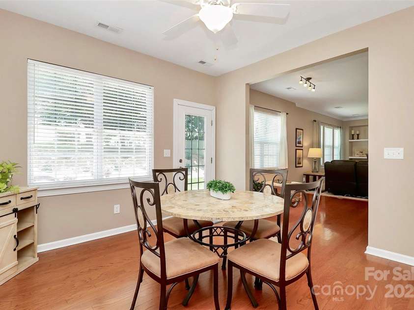1576 Bay Meadows Avenue, Concord, NC 28027.  MLS# CAR4282430, YatesRealty ID 32418. Sunroom off kitchen
