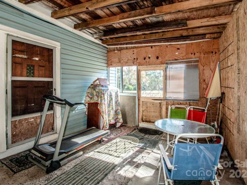 1118 Wall Street, Statesville, NC 28677.  MLS# CAR4191954, YatesRealty ID 3242. Enclosed Porch