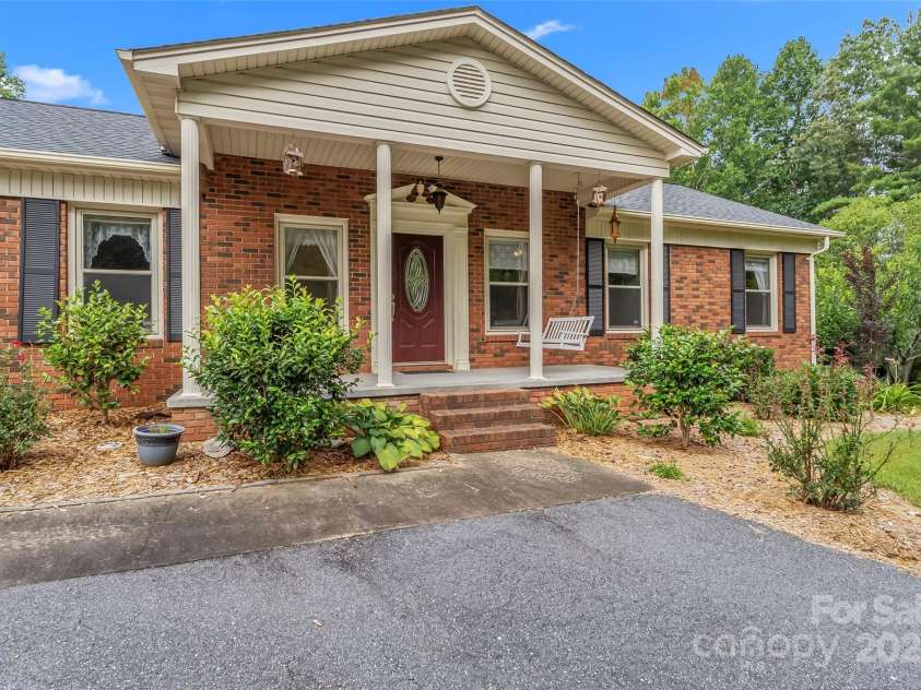 2423 Warrior Fork Trail, Morganton, NC 28655.  MLS# CAR4285223, YatesRealty ID 32420. Coffee and sunrises to be enjoyed from this porch!