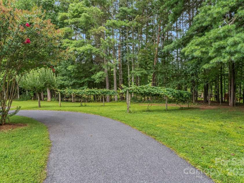 2423 Warrior Fork Trail, Morganton, NC 28655.  MLS# CAR4285223, YatesRealty ID 32420. Driveway - leading around to the basement