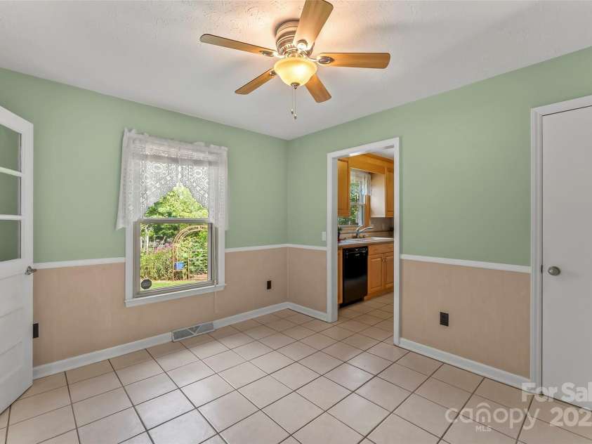2423 Warrior Fork Trail, Morganton, NC 28655.  MLS# CAR4285223, YatesRealty ID 32420. Tiled eating area beside the kitchen