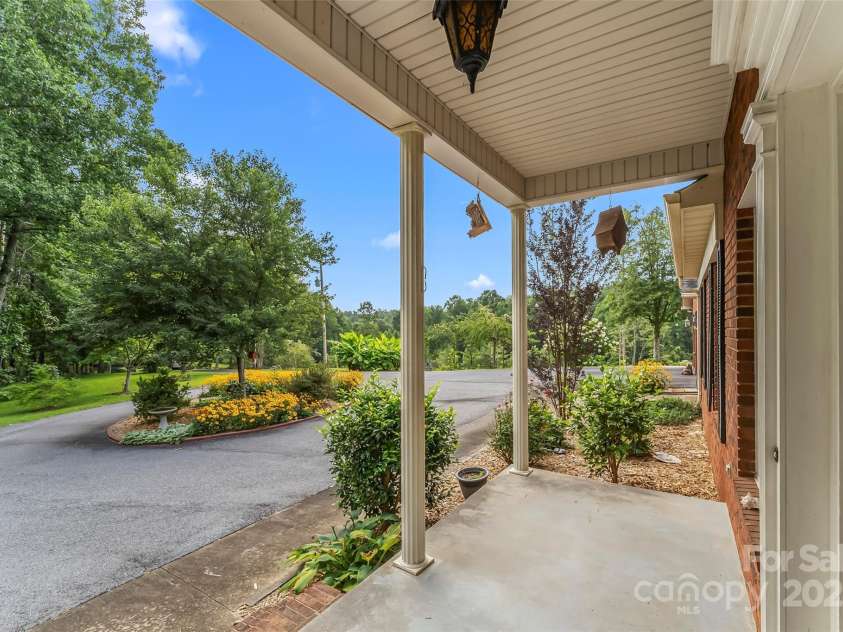 2423 Warrior Fork Trail, Morganton, NC 28655.  MLS# CAR4285223, YatesRealty ID 32420. View from the porch swing
