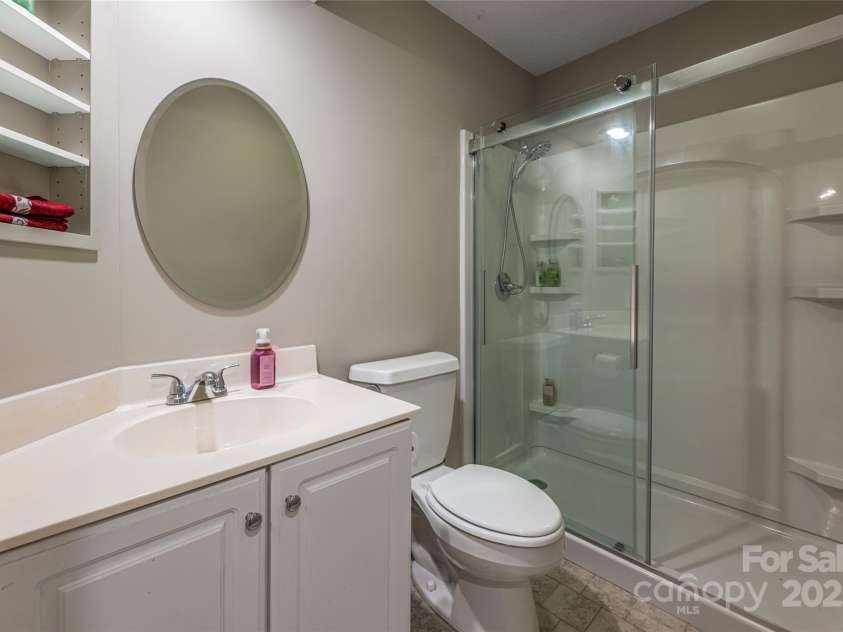 25 Weston Heights Drive, Asheville, NC 28803.  MLS# CAR4285922, YatesRealty ID 32421. Upstairs 2nd full bath