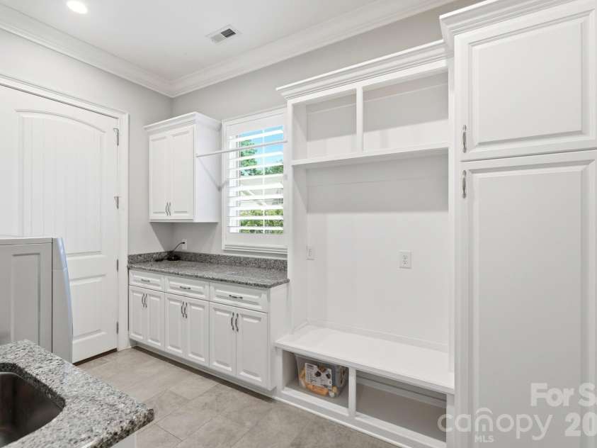 5426 Baker Lane, Lake Wylie, SC 29710.  MLS# CAR4394632, YatesRealty ID 32423. Laundry room with sink!