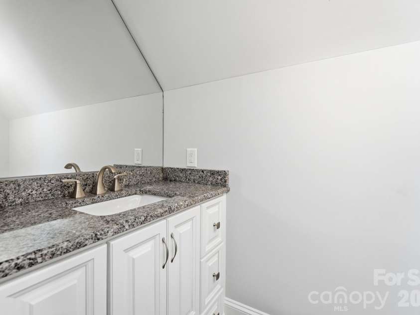 5426 Baker Lane, Lake Wylie, SC 29710.  MLS# CAR4394632, YatesRealty ID 32423. Upstairs half bath.