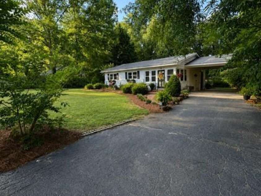 606 Pine Lane, Wadesboro, NC 28170.  MLS# CAR4396579, YatesRealty ID 32424. Right Side View