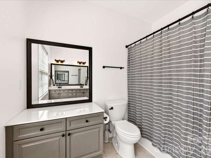 12023 Overlook Mountain Drive, Charlotte, NC 28216.  MLS# CAR4388070, YatesRealty ID 32428. Bathroom on the second floor