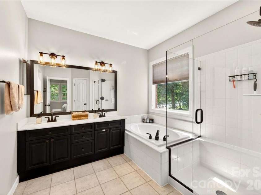 12023 Overlook Mountain Drive, Charlotte, NC 28216.  MLS# CAR4388070, YatesRealty ID 32428. Primary bathroom