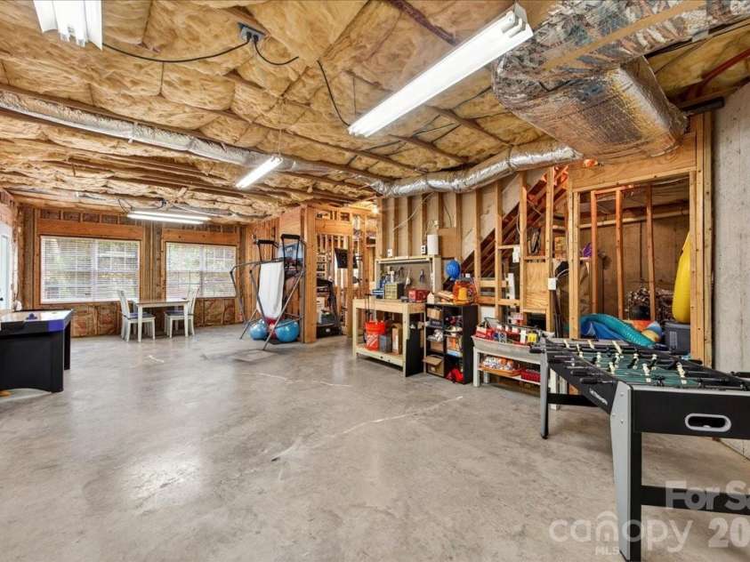 12023 Overlook Mountain Drive, Charlotte, NC 28216.  MLS# CAR4388070, YatesRealty ID 32428. Unfinished basement
