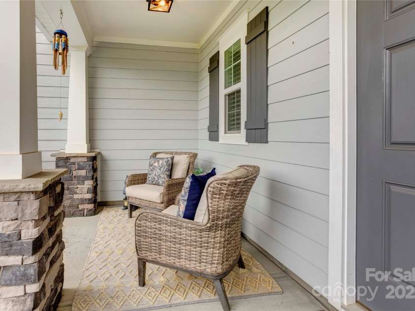 3826 Dahlia Drive, Harrisburg, NC 28075.  MLS# CAR4292073, YatesRealty ID 32429. Front porch sitting