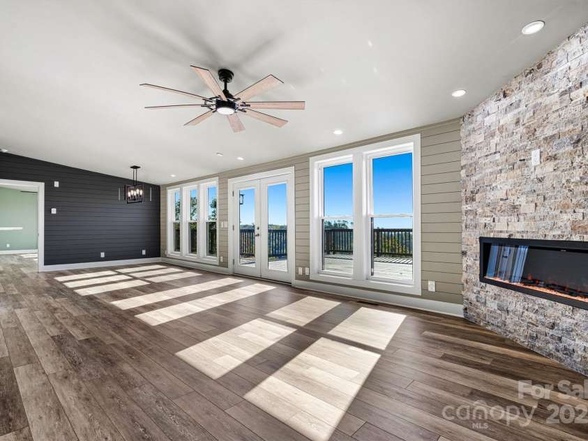 6230 Pine Ridge Drive, Connelly Springs, NC 28612.  MLS# CAR4194799, YatesRealty ID 3243. Beautiful accent feature walls and a modern cozy fireplace