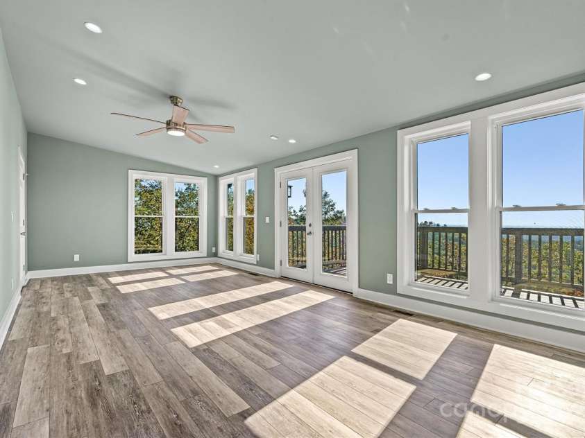 6230 Pine Ridge Drive, Connelly Springs, NC 28612.  MLS# CAR4194799, YatesRealty ID 3243. Primary Suite #1 with double doors that lead onto the deck