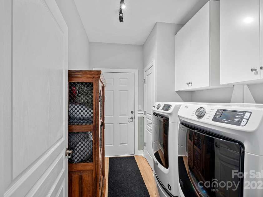 1108 Phar Lap Drive, Indian Trail, NC 28079.  MLS# CAR4290499, YatesRealty ID 32432. Laundry room w/ built in Cabinets- LVP Flooring- Coat closet