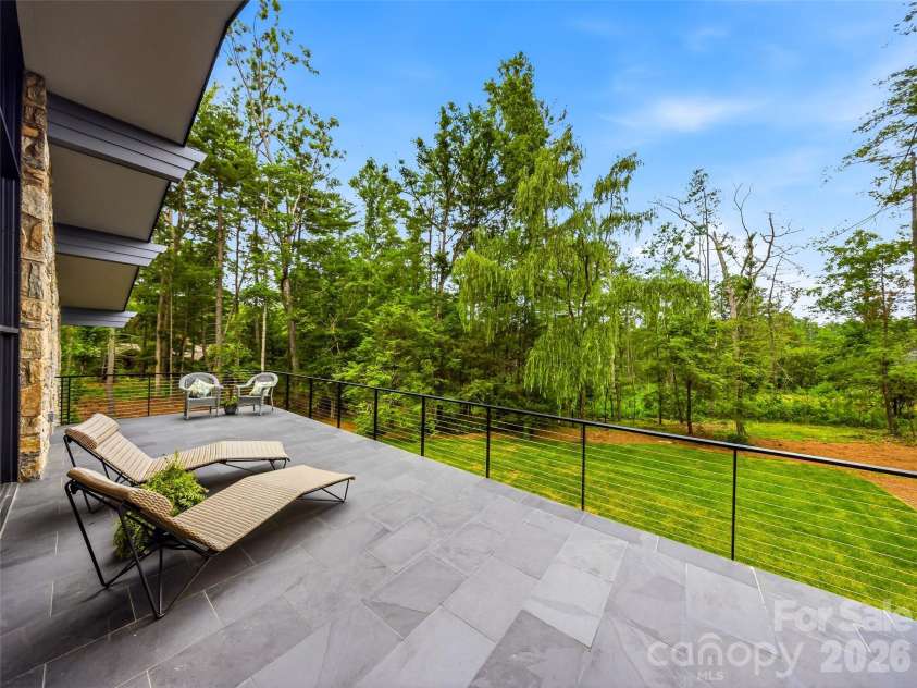 3 Holly Hill Road, Biltmore Forest, NC 28803.  MLS# CAR4396733, YatesRealty ID 32435. A cantilevered balcony extends from the main pavilion.
