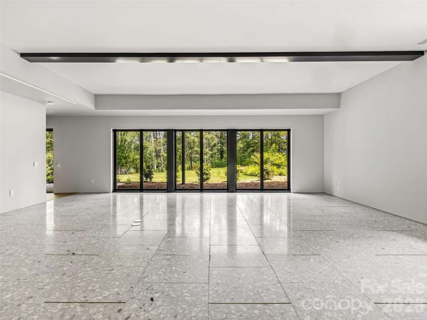 3 Holly Hill Road, Biltmore Forest, NC 28803.  MLS# CAR4396733, YatesRealty ID 32435. High-gloss, polished flooring adds elegance and durability to this functional space.