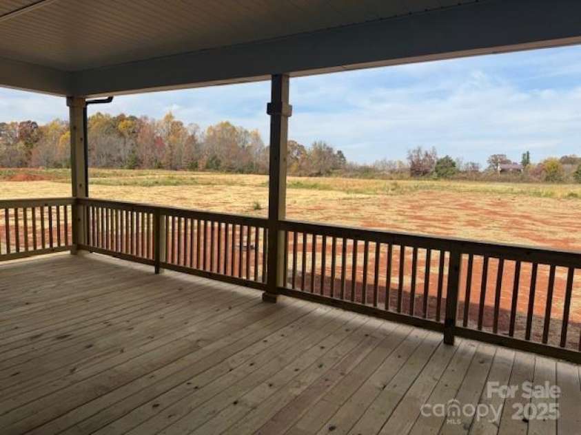 1150 Gardenia Drive, Mt Ulla, NC 28125.  MLS# CAR4285874, YatesRealty ID 32438. Huge covered Deck!