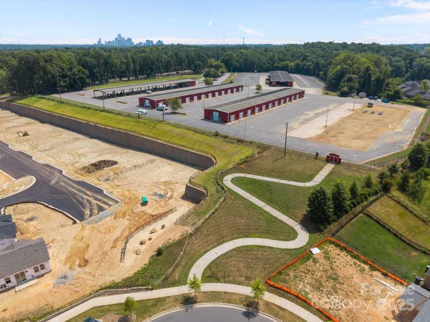 3018 Potomac River Parkway, Charlotte, NC 28217.  MLS# CAR4284593, YatesRealty ID 32443. City Park has trail access directly into Charlotte Regional Farmer's Market.  One of just four regional farmer's markets in the state that are owned and operated by NC Dept of Agriculture and Consumer Services!