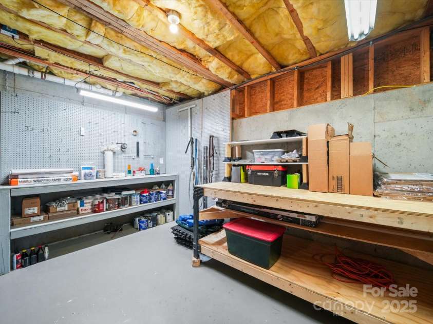 7408 Golf Course Drive, Denver, NC 28037.  MLS# CAR4287622, YatesRealty ID 32446. Workshop in Basement