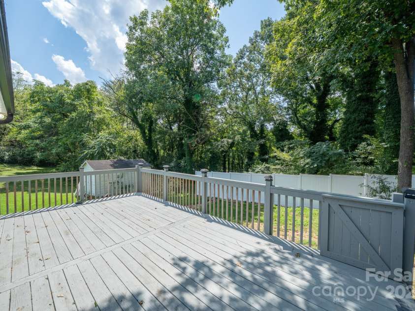 308 Graham Drive, Dallas, NC 28034.  MLS# CAR4292826, YatesRealty ID 32452. Large deck with gate