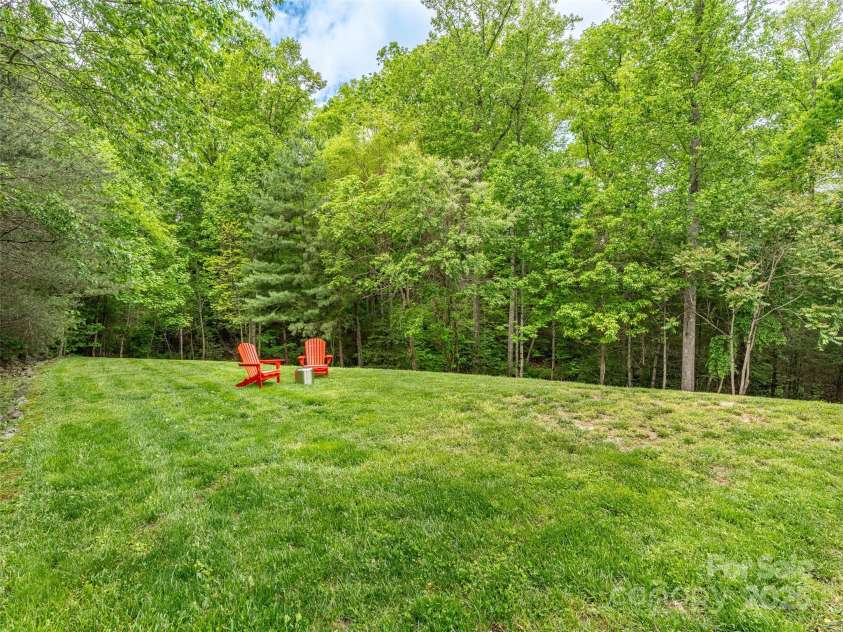 33 Village Pointe Lane, Asheville, NC 28803.  MLS# CAR4254974, YatesRealty ID 32453. A park-like setting for your weekends at home